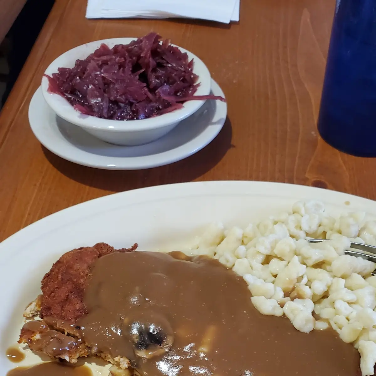 Schnitzel with Fried Potatoes and Red Cabbage