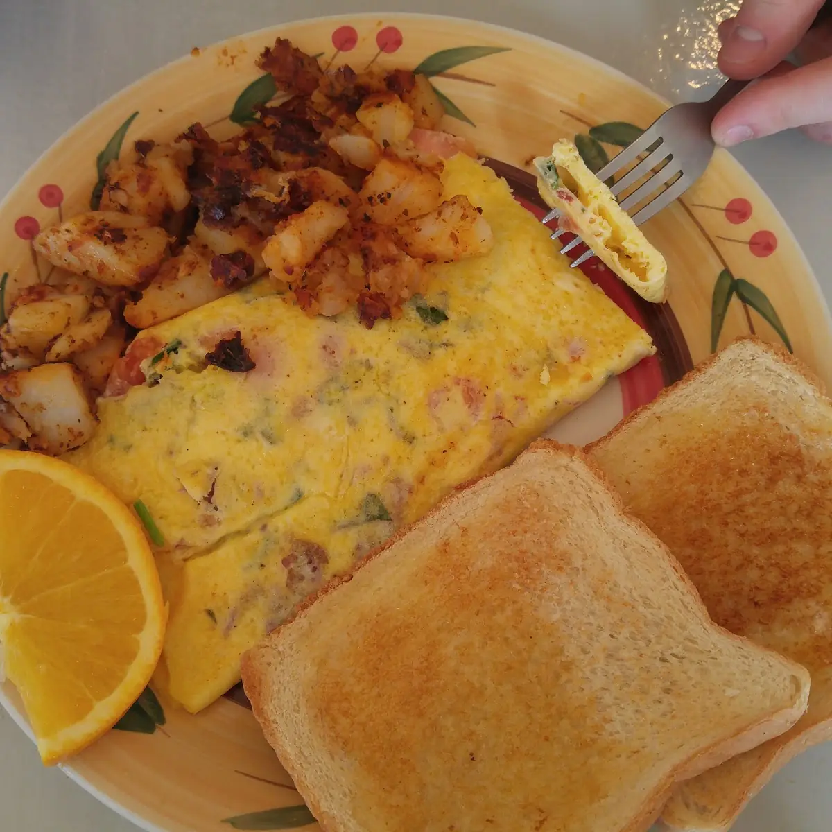 Cinnamon Raisin Toast Omelette and Potatoes