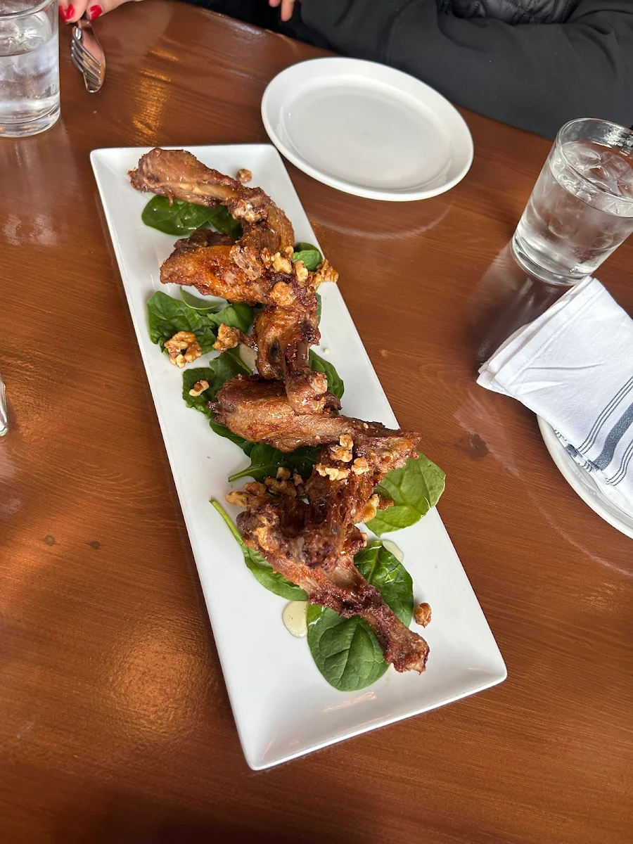 Chipotle Mango Duck Wings, Iron Goat Pub & Grill