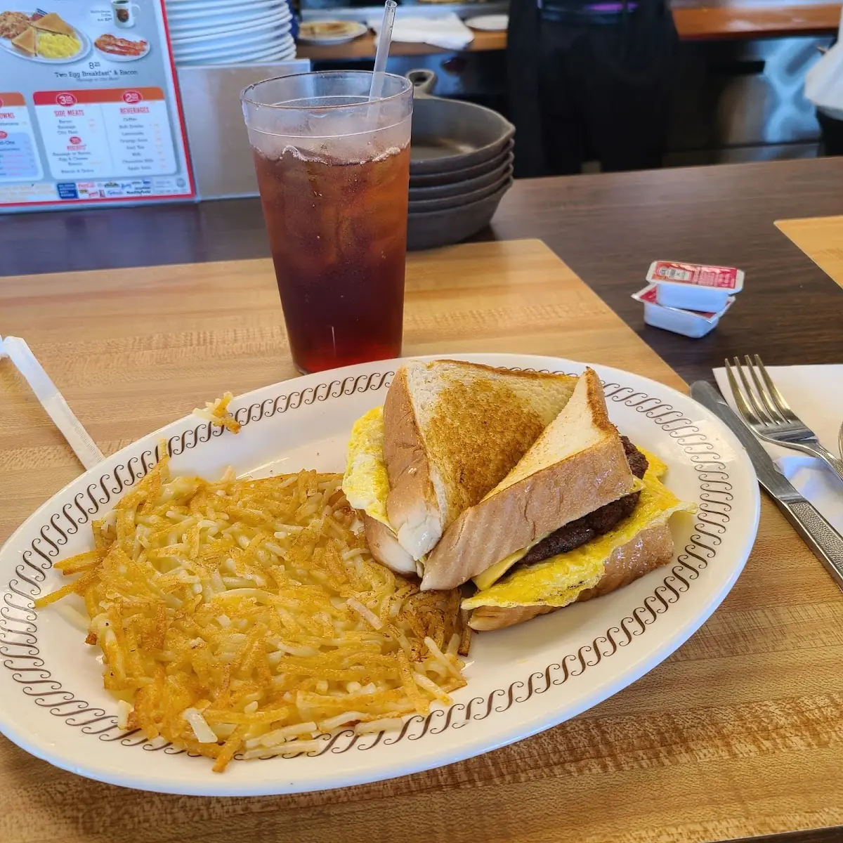 Texas Bacon Egg and Cheese with Hash Browns