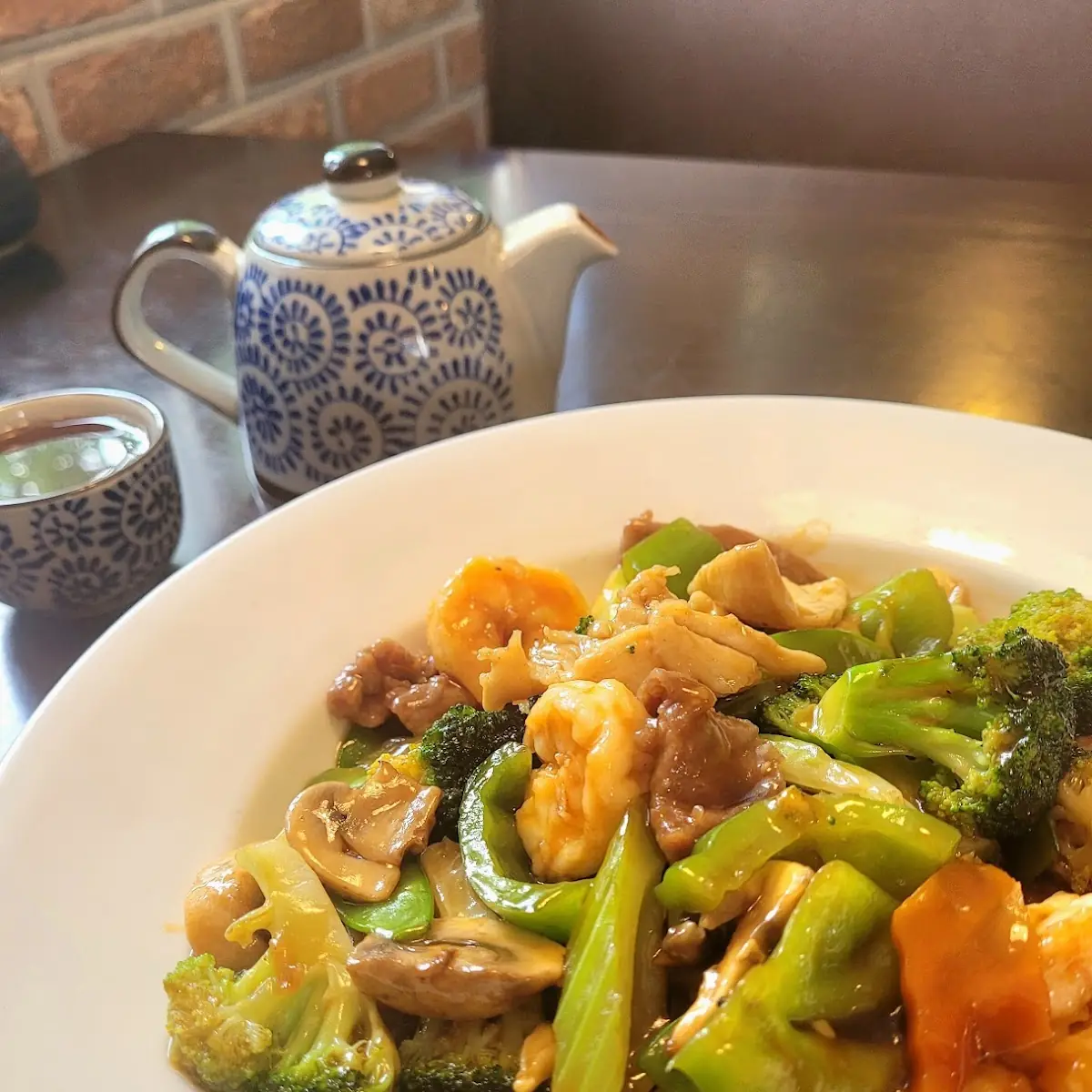 Mixed Vegetables and Meats over Pork Dumplings