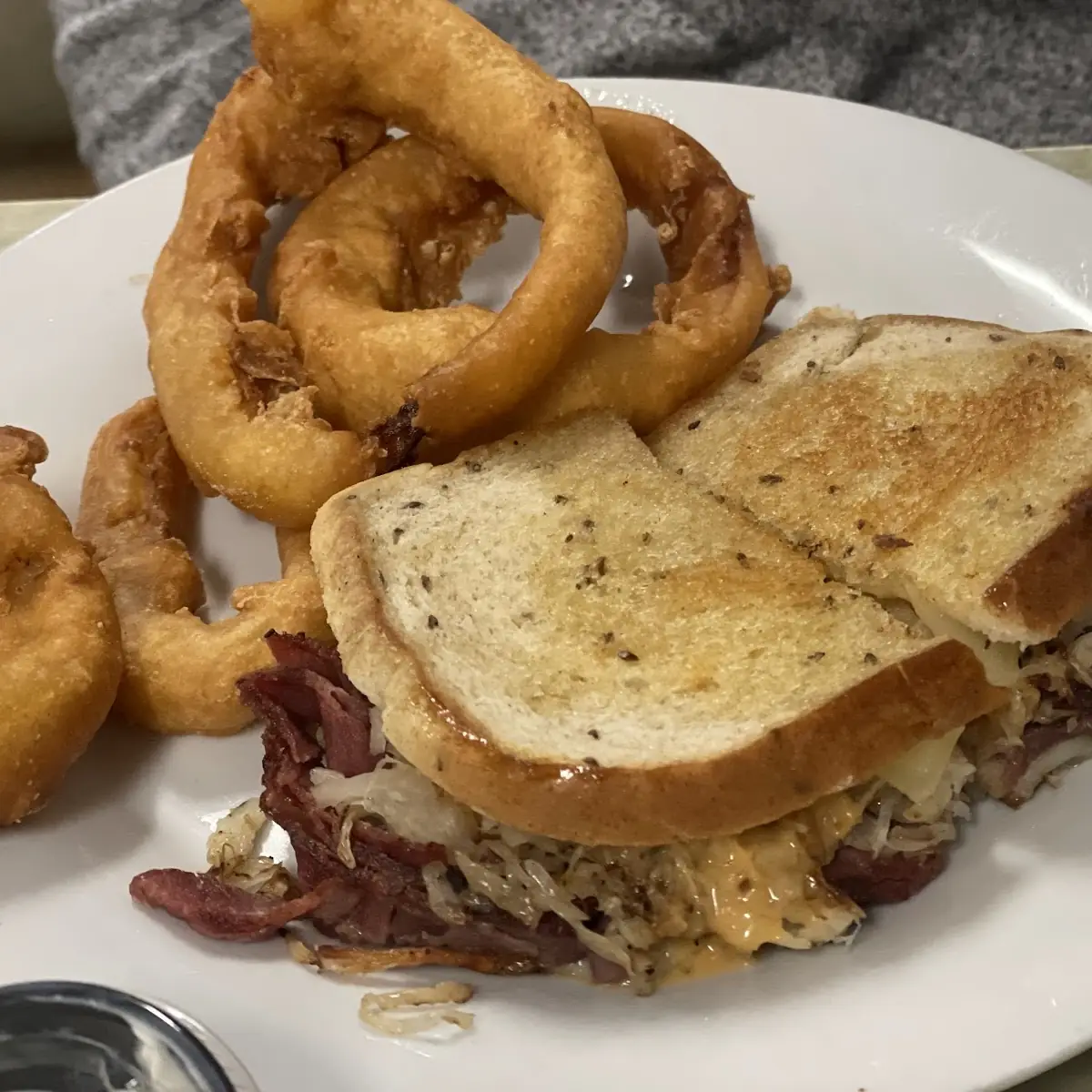 Rueben Sandwich and Onion Rings