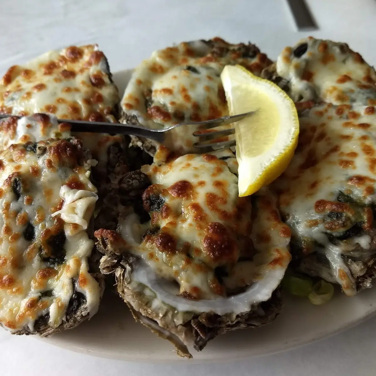 Oysters Rockefeller or Clams Casino Half Dozen