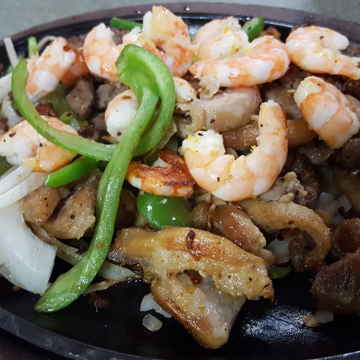 Sizzling Shrimp and Steak Fajitas