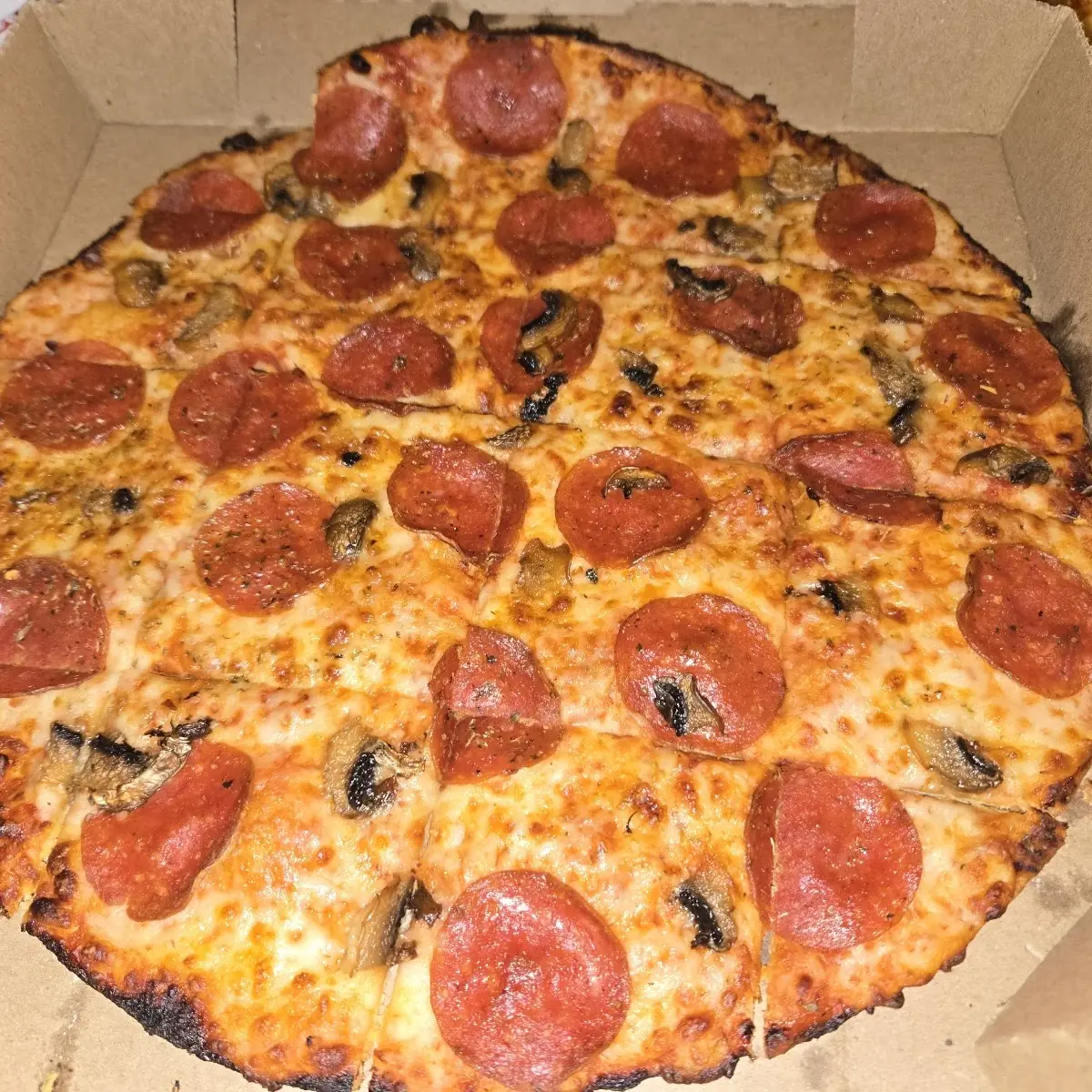 Thin Crust Pepperoni and Mushroom Pizza