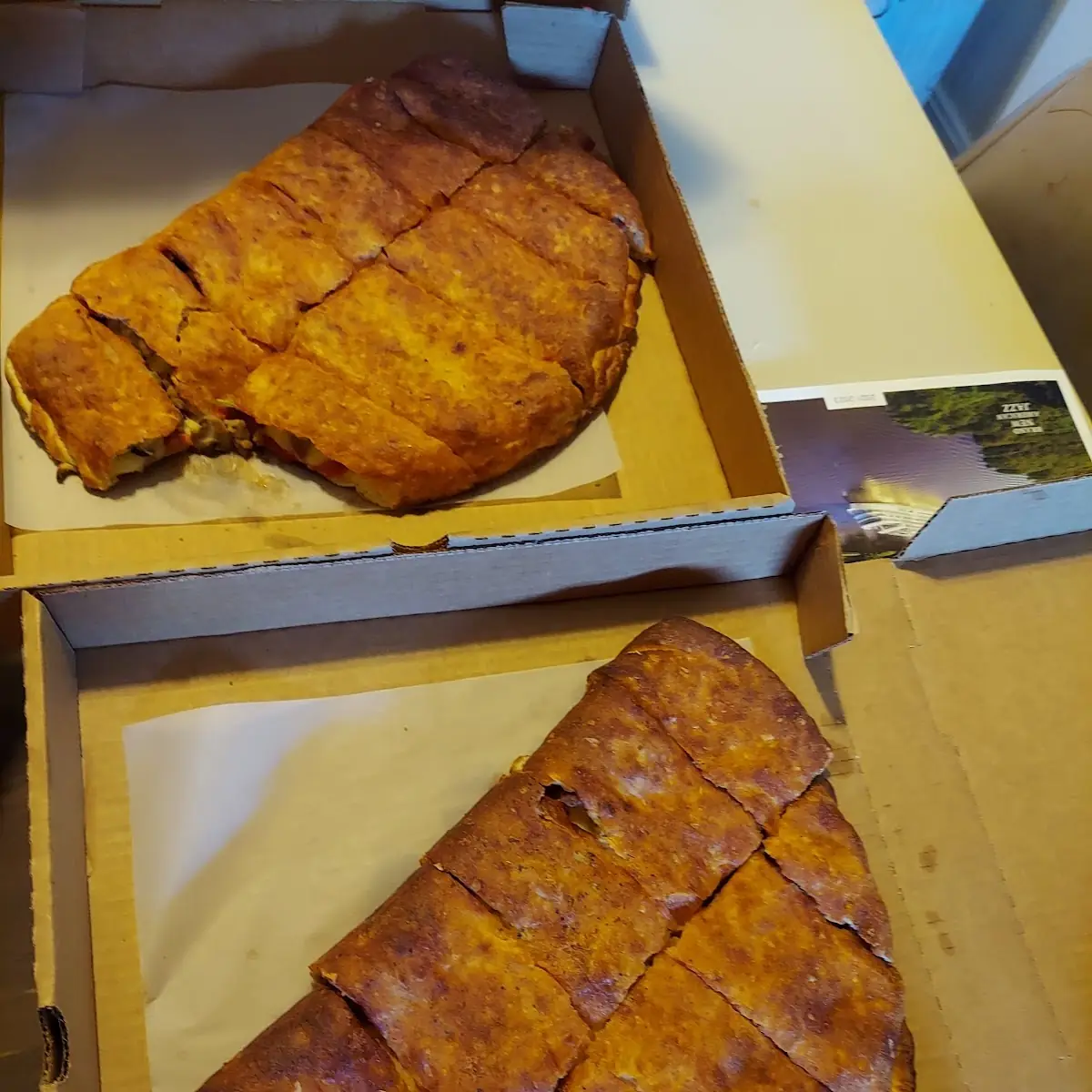 Meat Lovers and Supreme Calzones