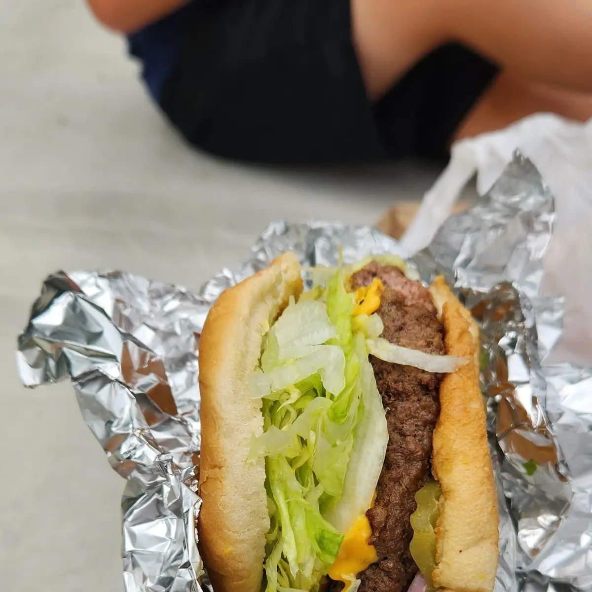Super Cheeseburger with Grilled Onions