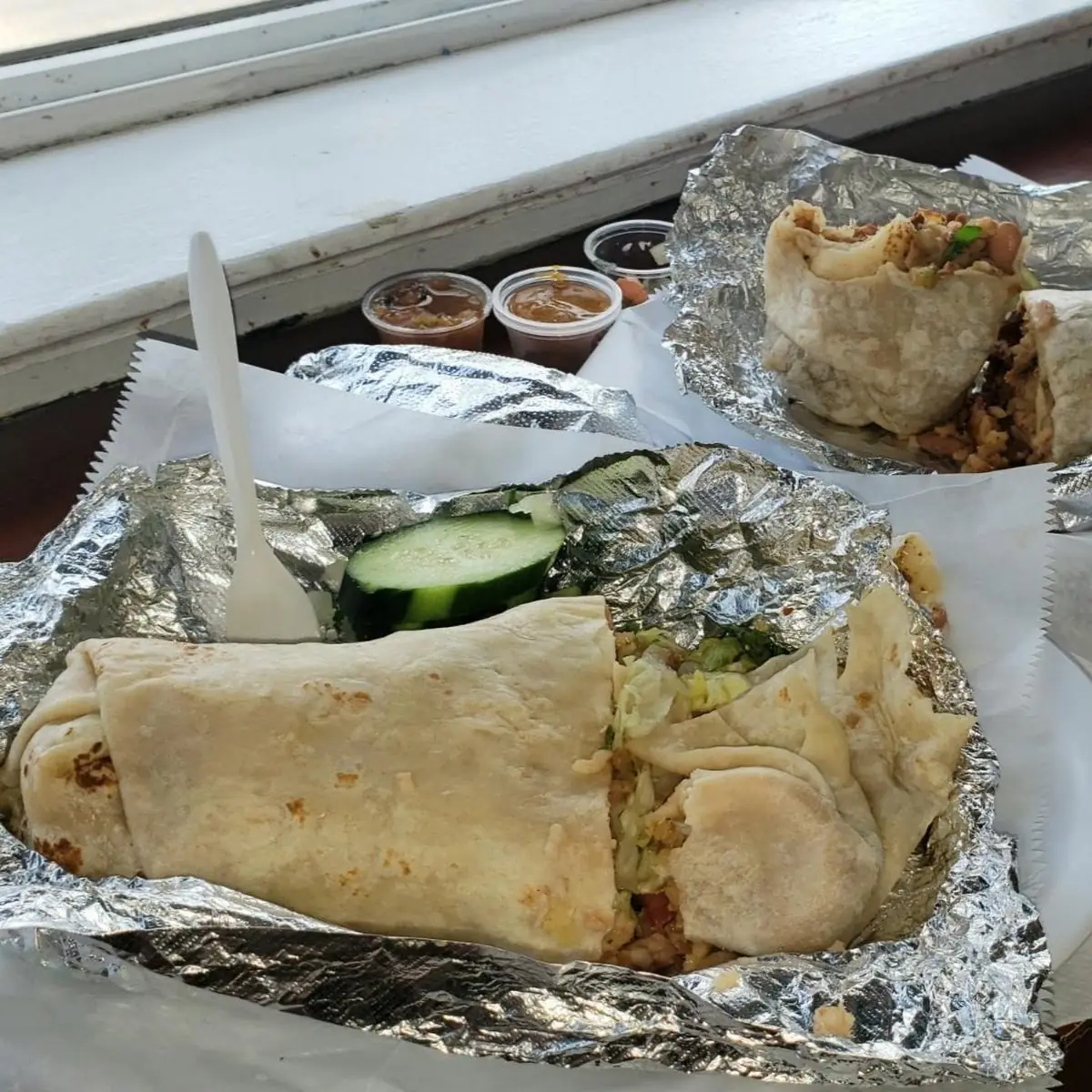 Veggie Burrito and Carnitas Burrito