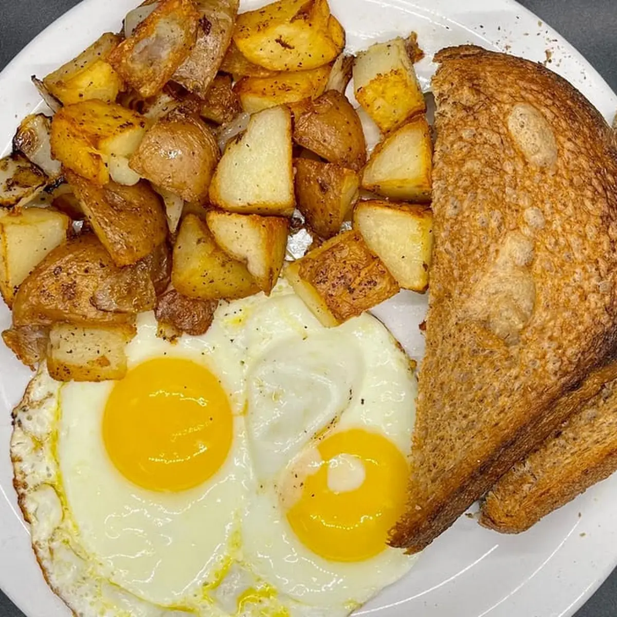 Two Eggs Potatoes & Toast