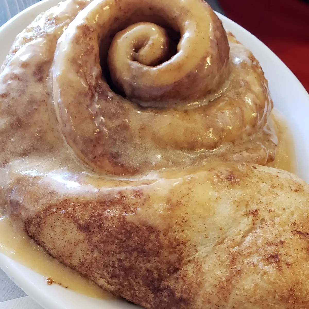 Cinnamon Roll with Pumpkin Spice Frosting