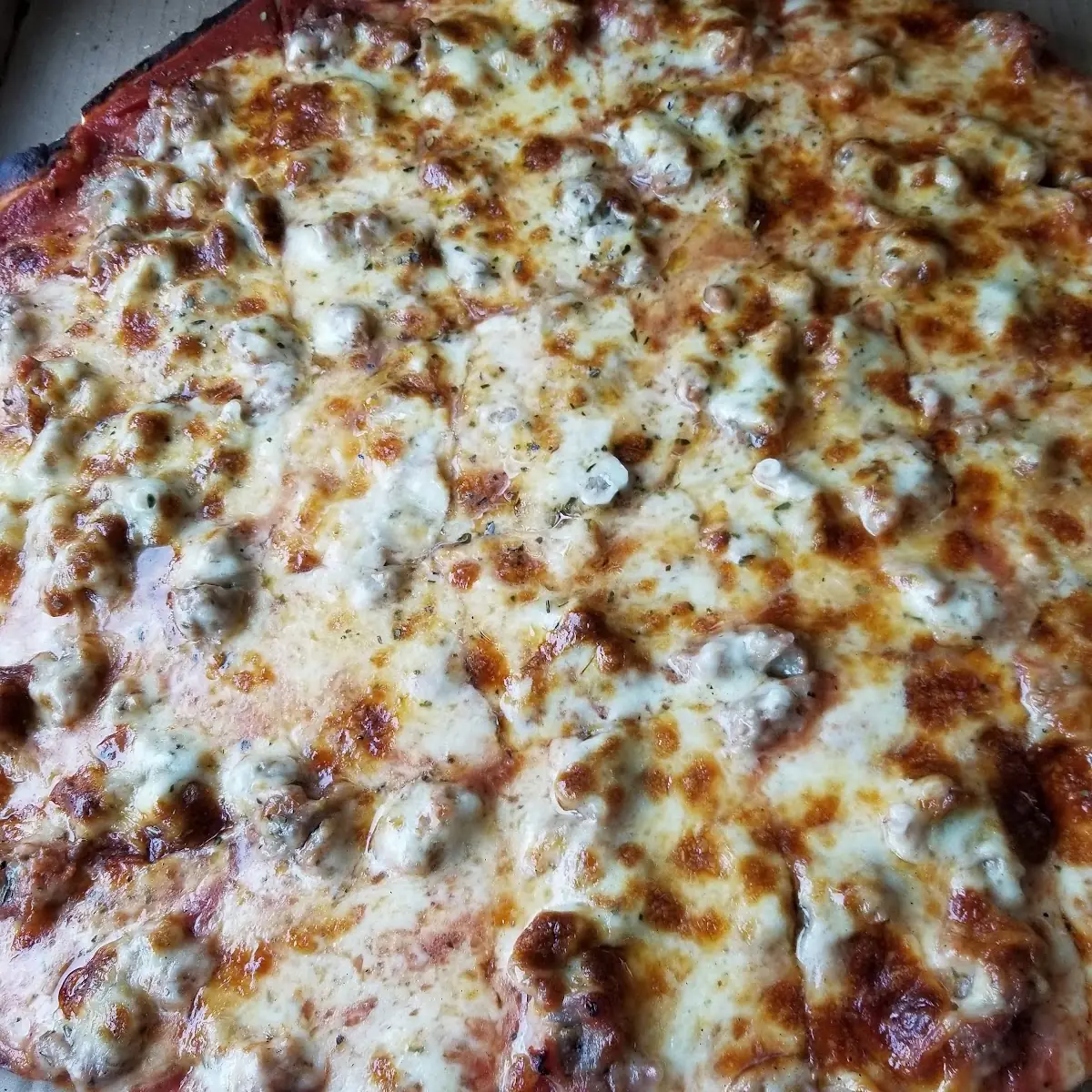Thin Crust Cheese and Sausage Pizza