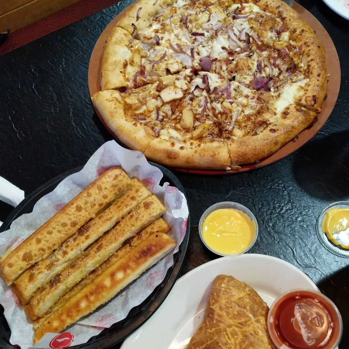 Barbecue Chicken Pizza Supreme Pzone and Bread Sticks w Cheese