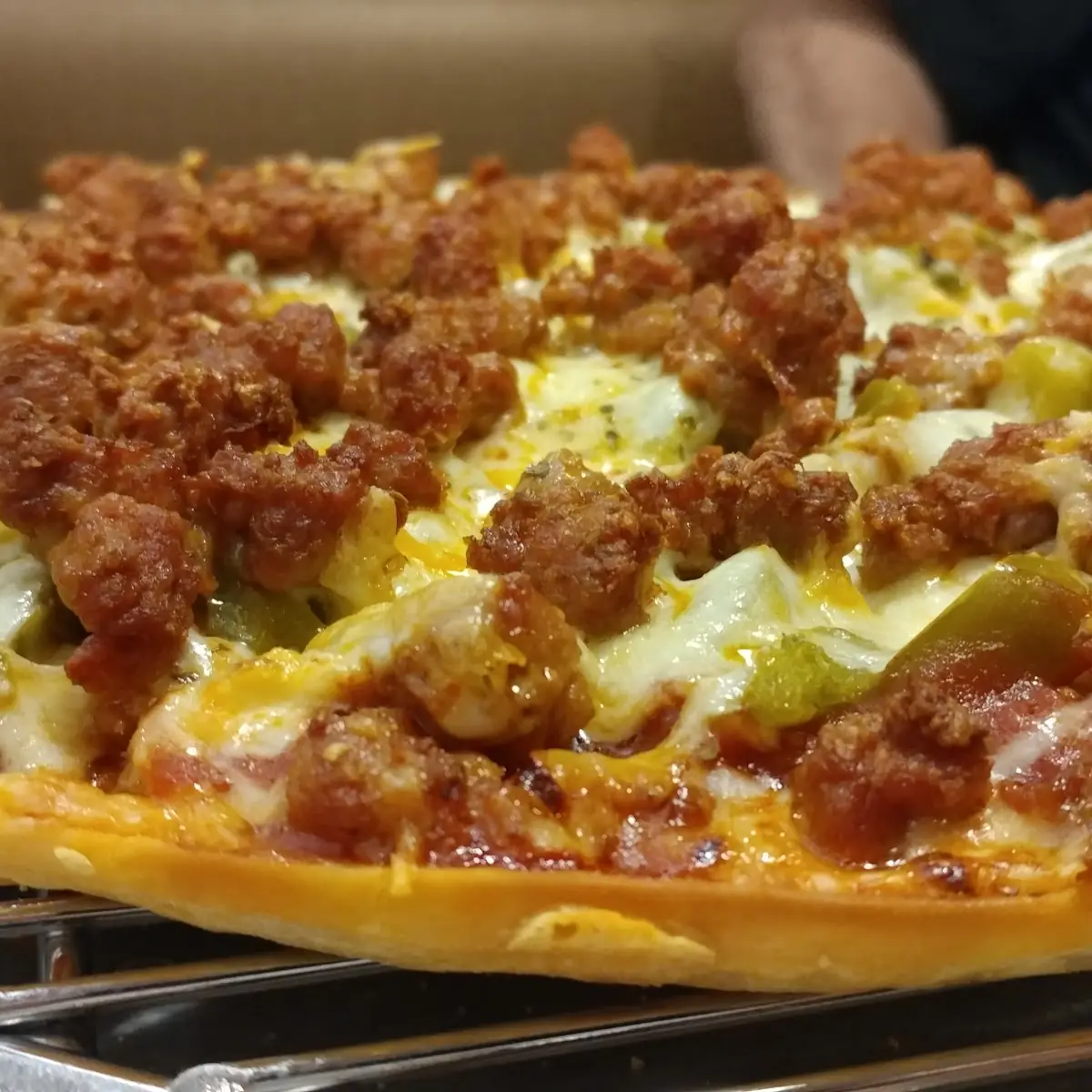 Thin Crust Pizza with Extra Sausage