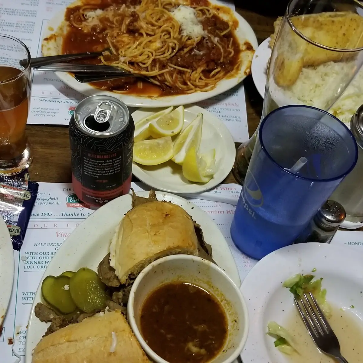 Spaghetti Dish Pastrami Sandwich and a Roast Beef Dip