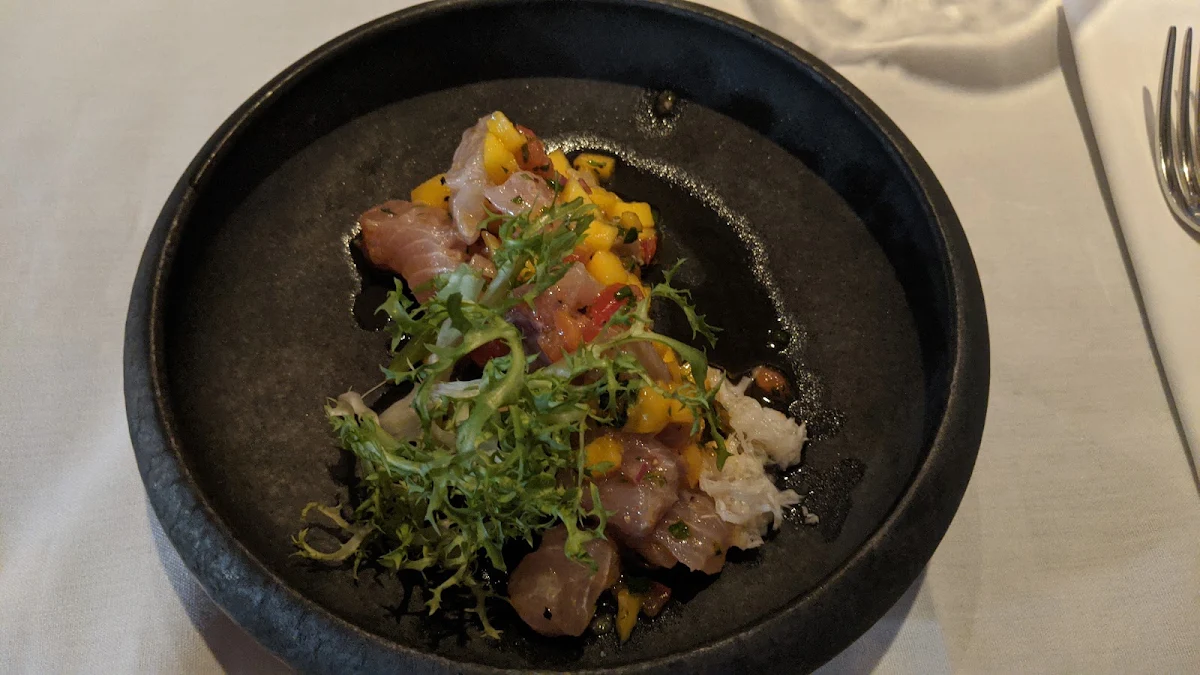 Crispy Octopus on a Black-Eye Pea Hummus and Smoked Paprika Oil