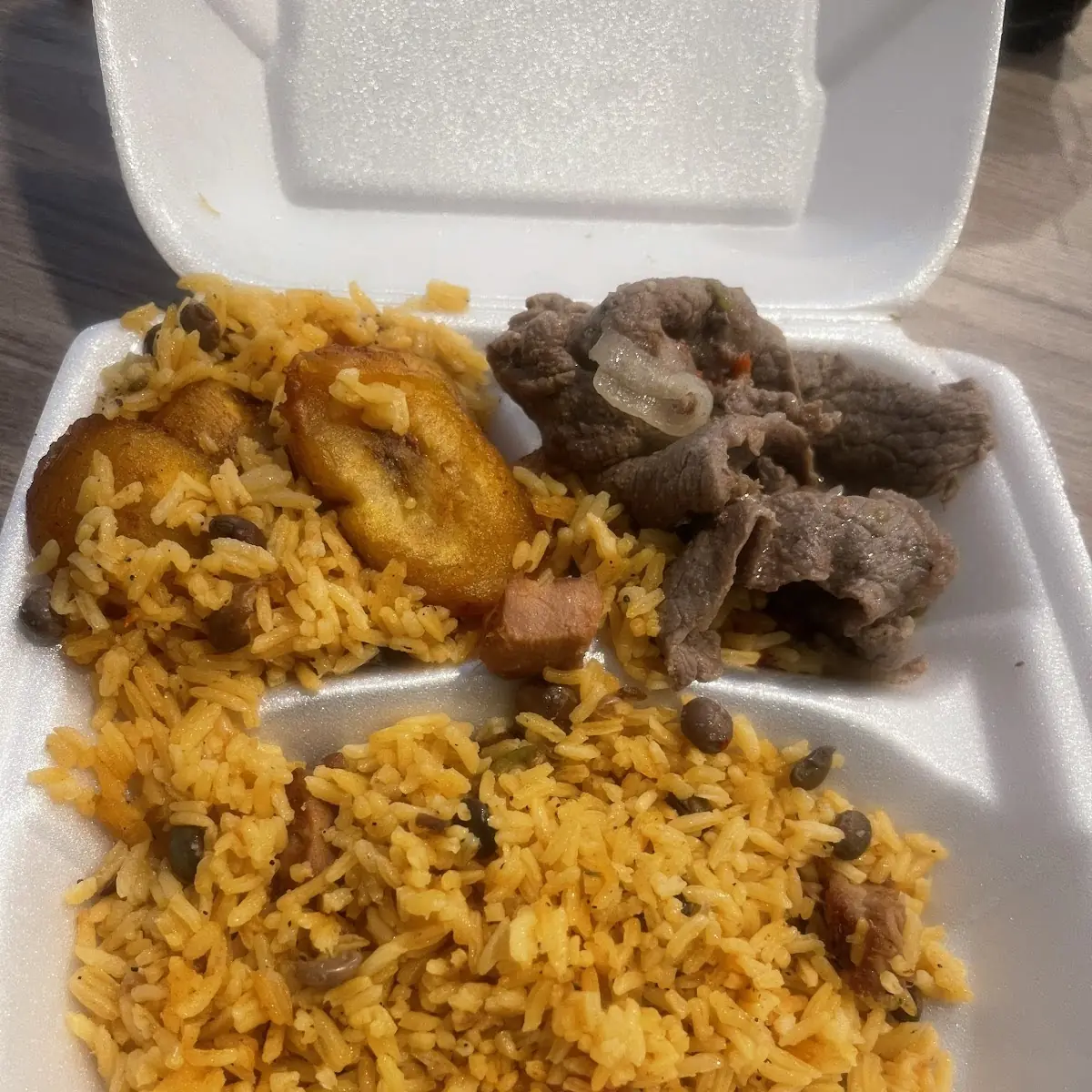 Yellow Rice with Peas and Beef Steak