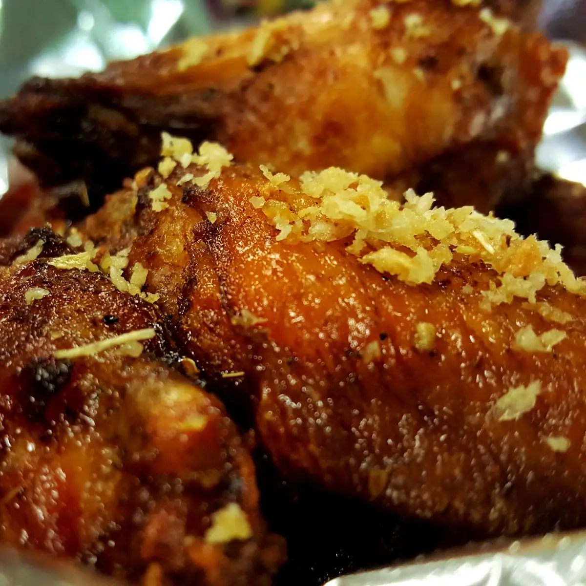 Marimated Chicken Wings Fried and Tossed in Spley
