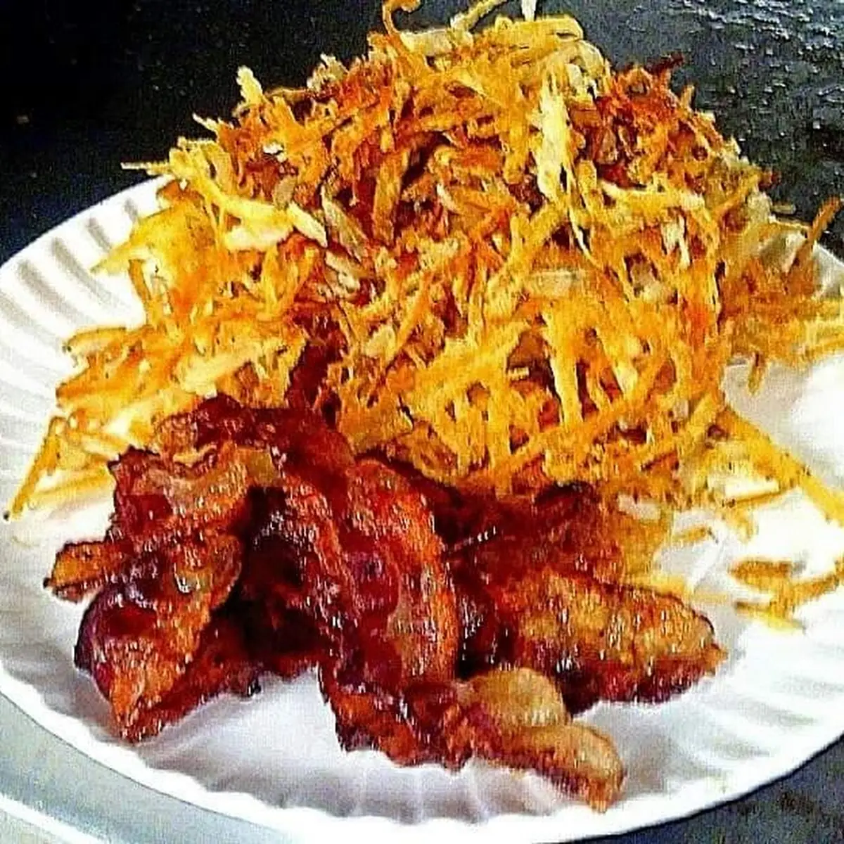 Piled High Hash Browns with a Side of Extra Thick Cut Bacon