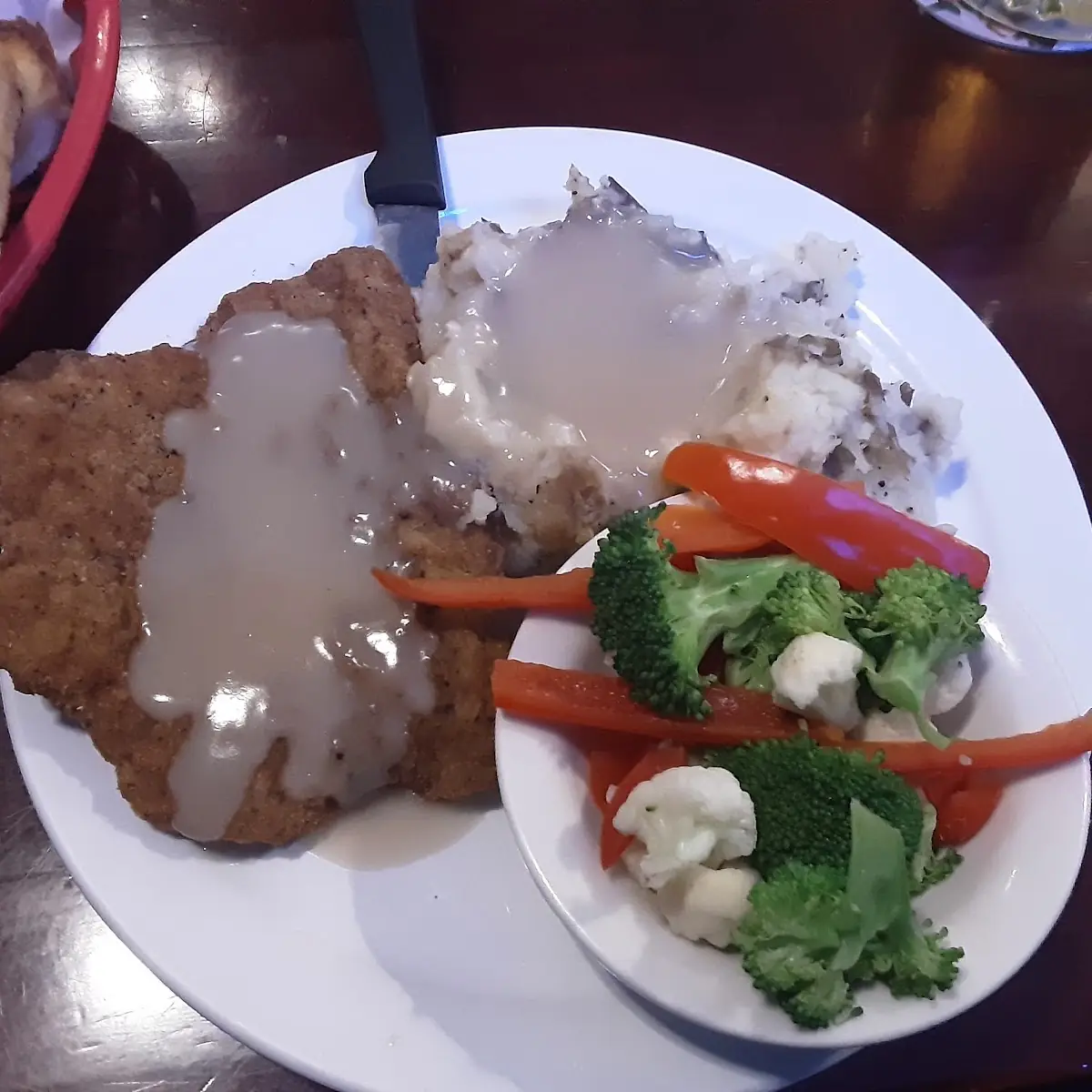 Lunch Special Chicken Fried Steak Veggies and Mashed Potato Gravy with Garlic Toast