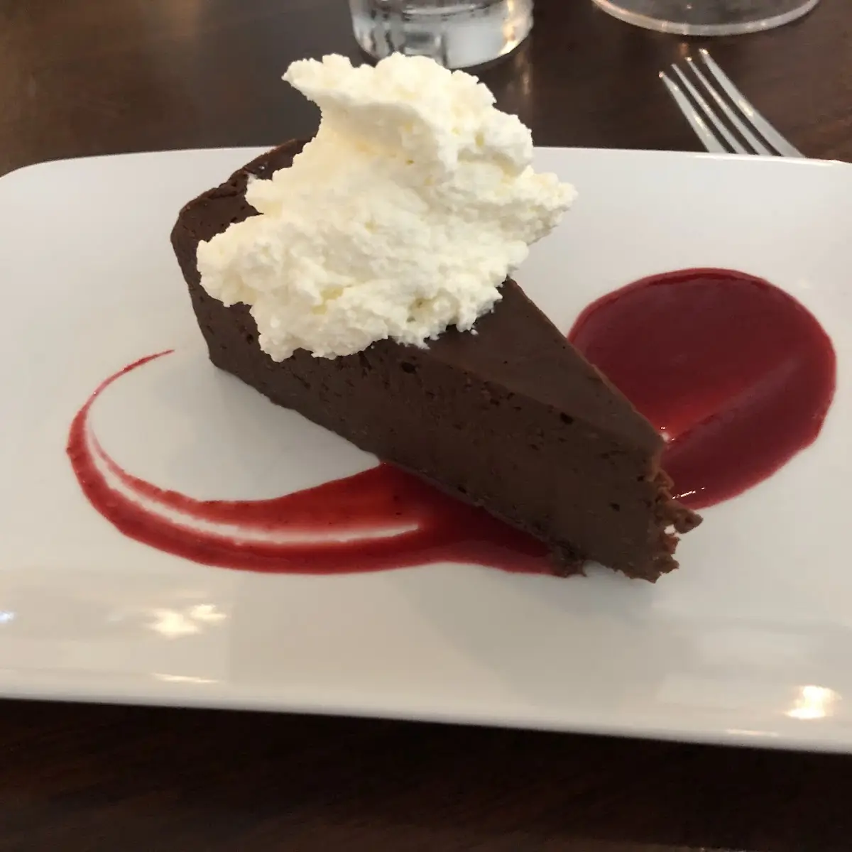 Fudge Cake with Raspberry Sauce & Chantilly Cream