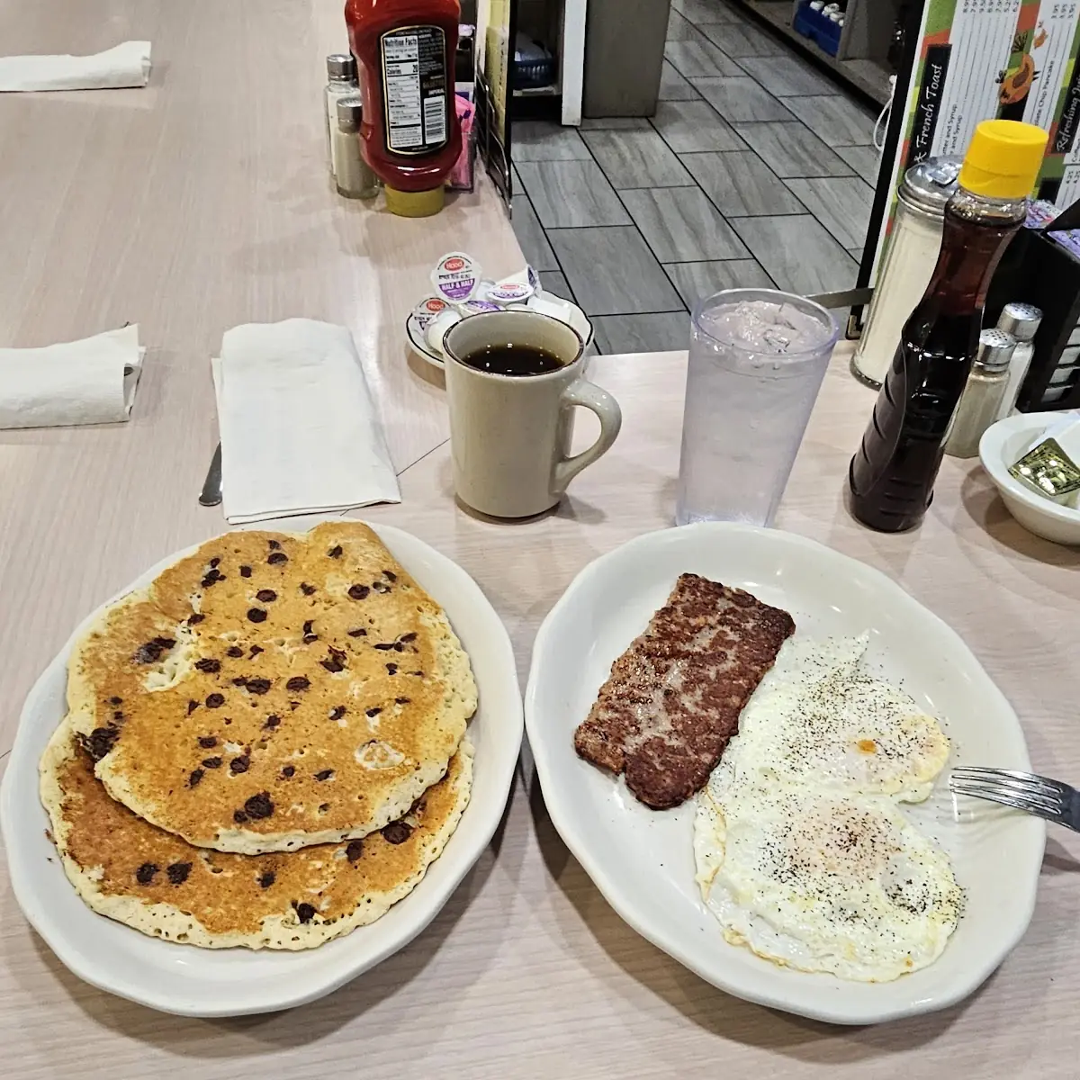 Chocolate Chip Pancakes Eggs and Sausage