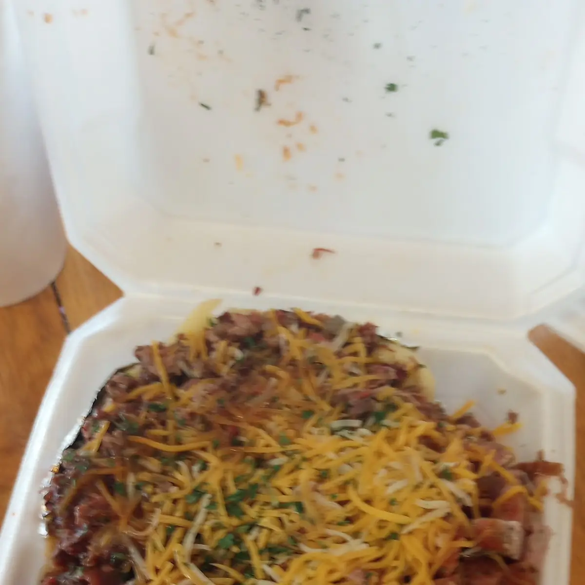 Loaded Baked Potato with Brisket and Sausage