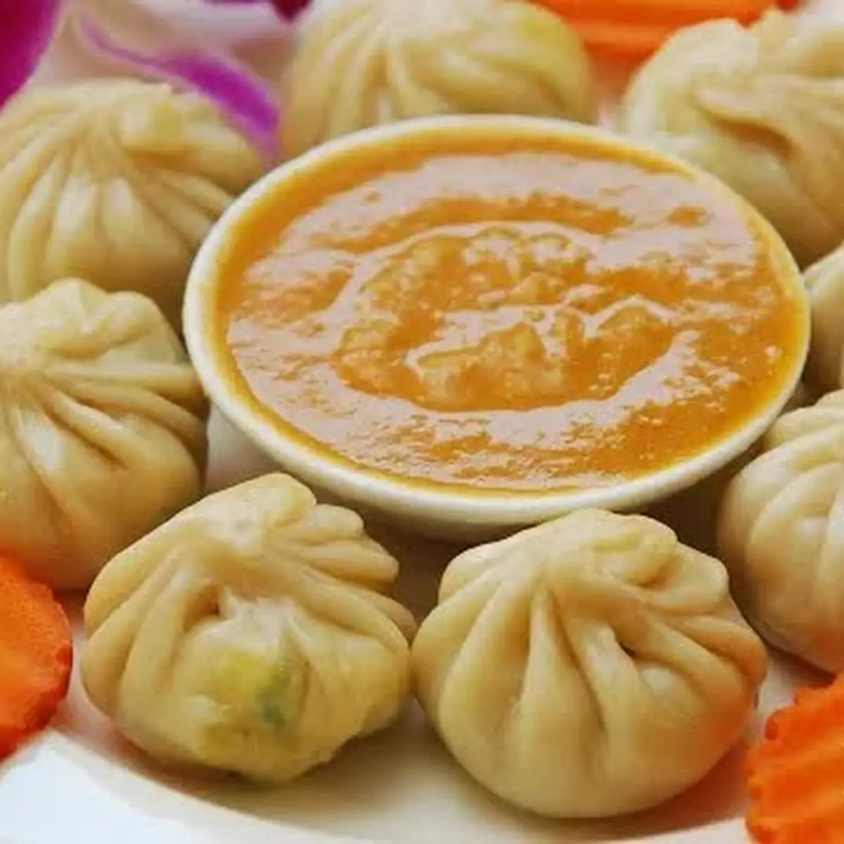 Steamed Chicken Momos with Spicy Sauce
