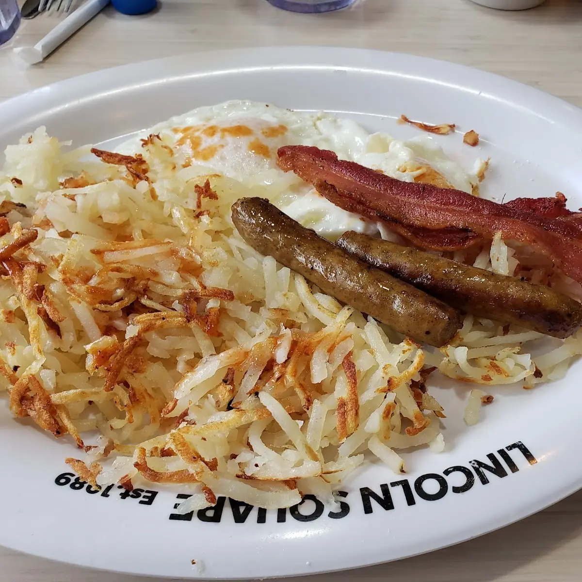 Eggs Hash Browns Bacon or Sausage