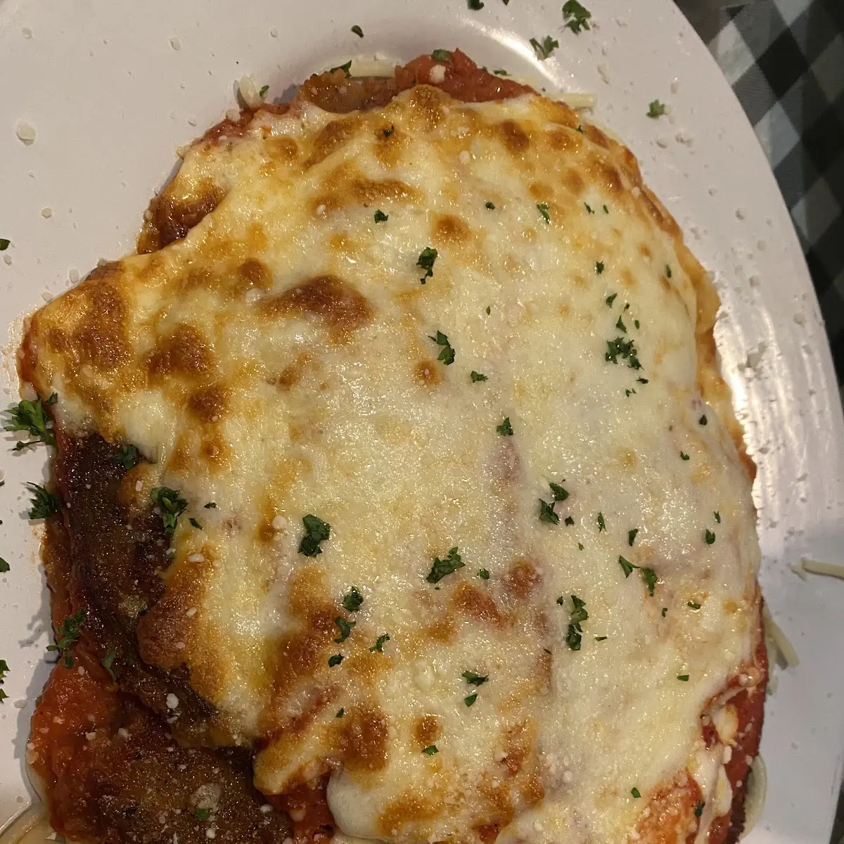 Eggplant Parmesan over Spaghetti