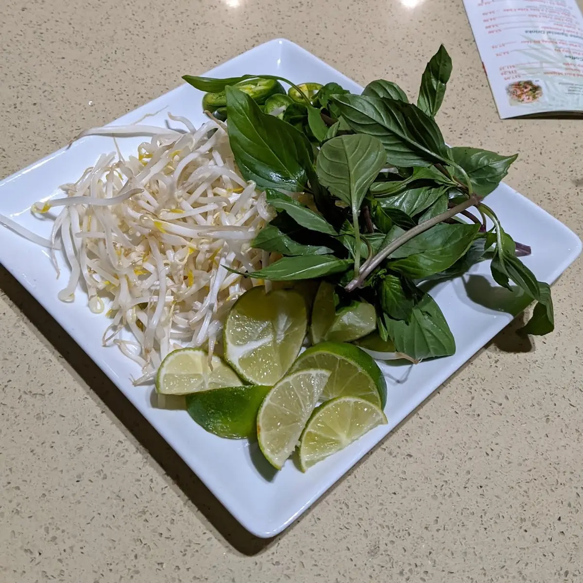 Bean Sprouts Thai Basil and Lime Wedges for Pho Soup