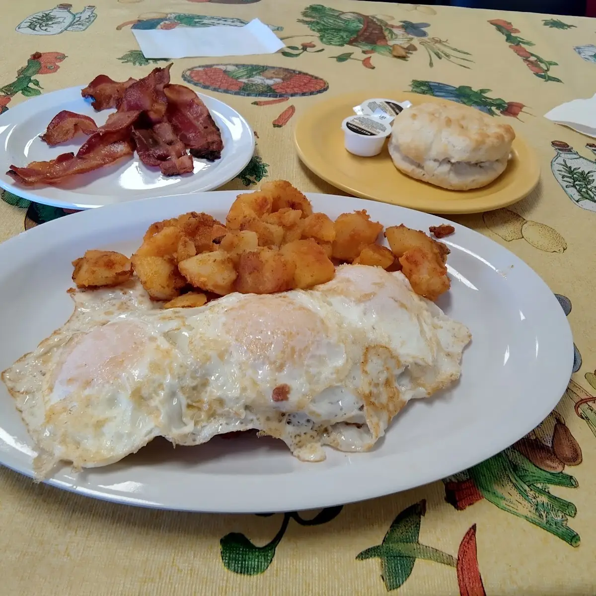Two Eggs over Medium Corned Beef Hash Extra Egg Side of Bacon