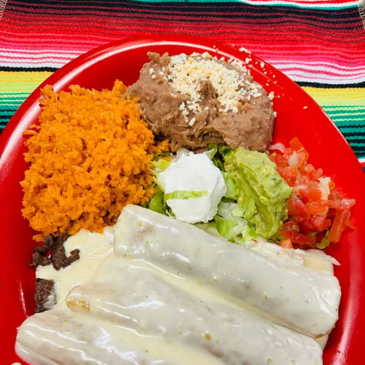 Shredded Chicken Enchiladas with Queso