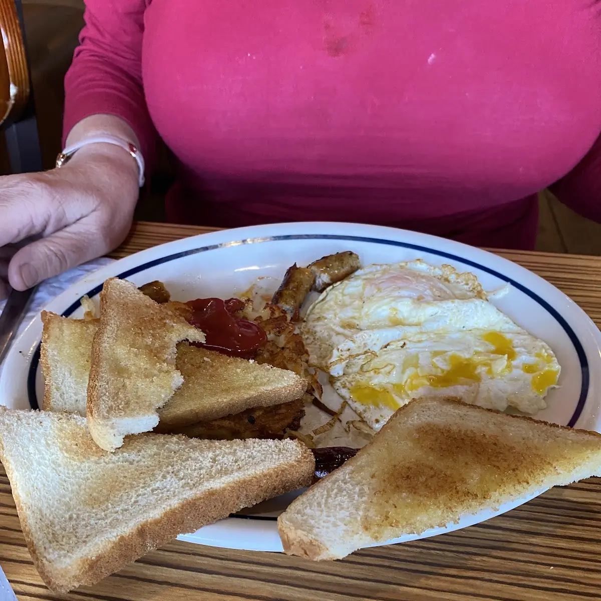 Two Eggs over Easy with Pork Sausage and Hash Brown