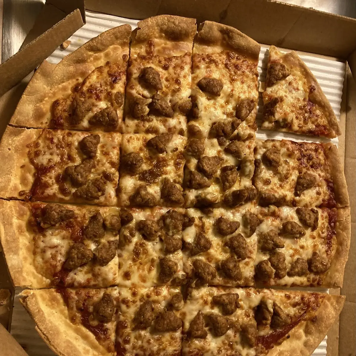 Thin Crust Cheese and Sausage Pizza