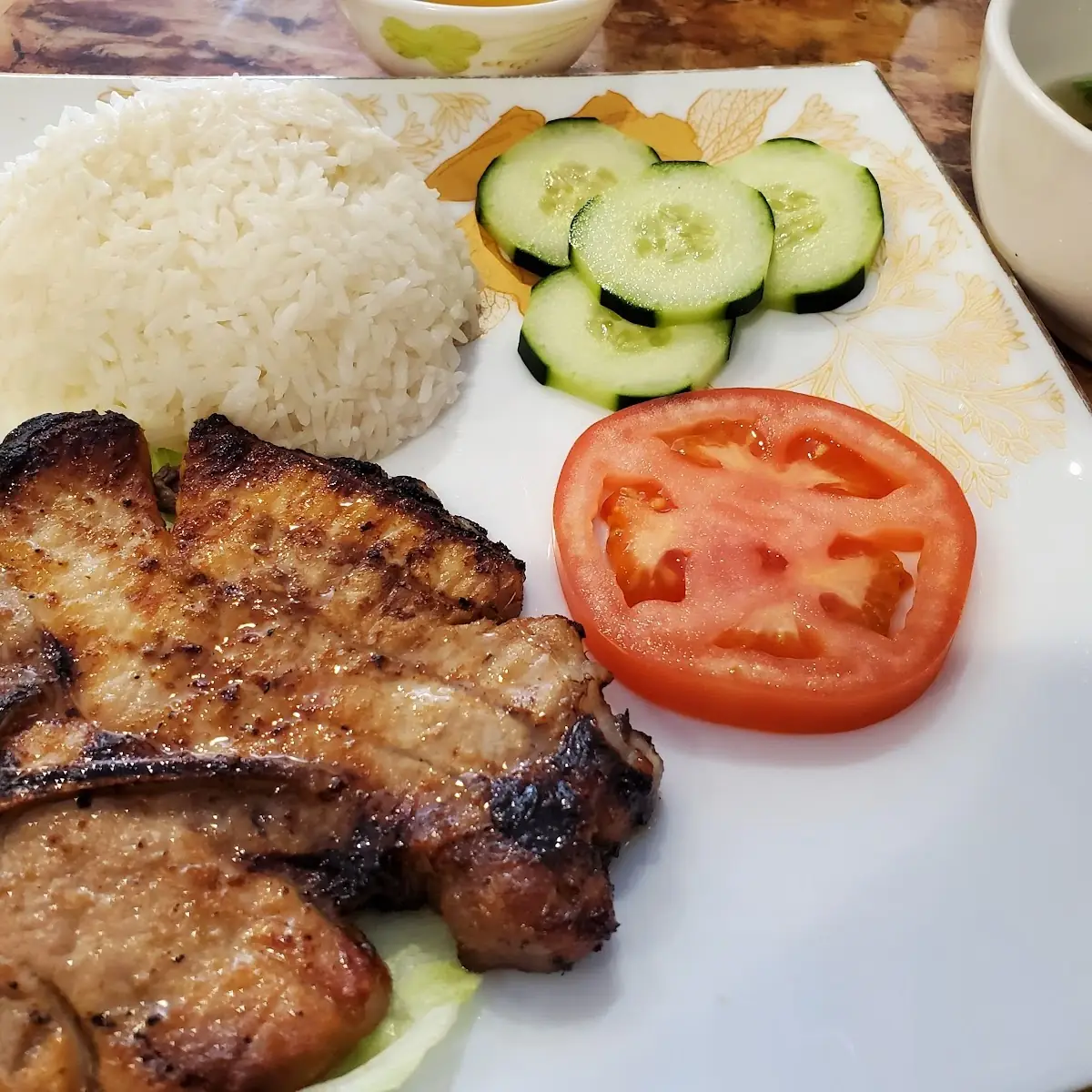 Grilled Pork Chop and Fried Egg