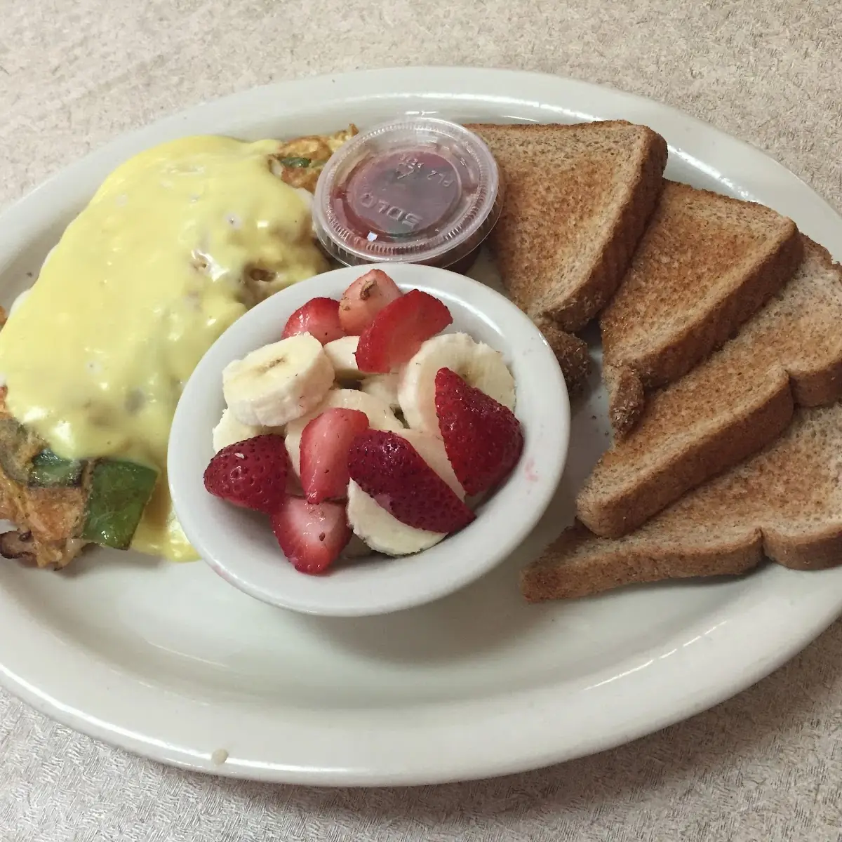 Turkey Omelet with Fruit Cup and Toast