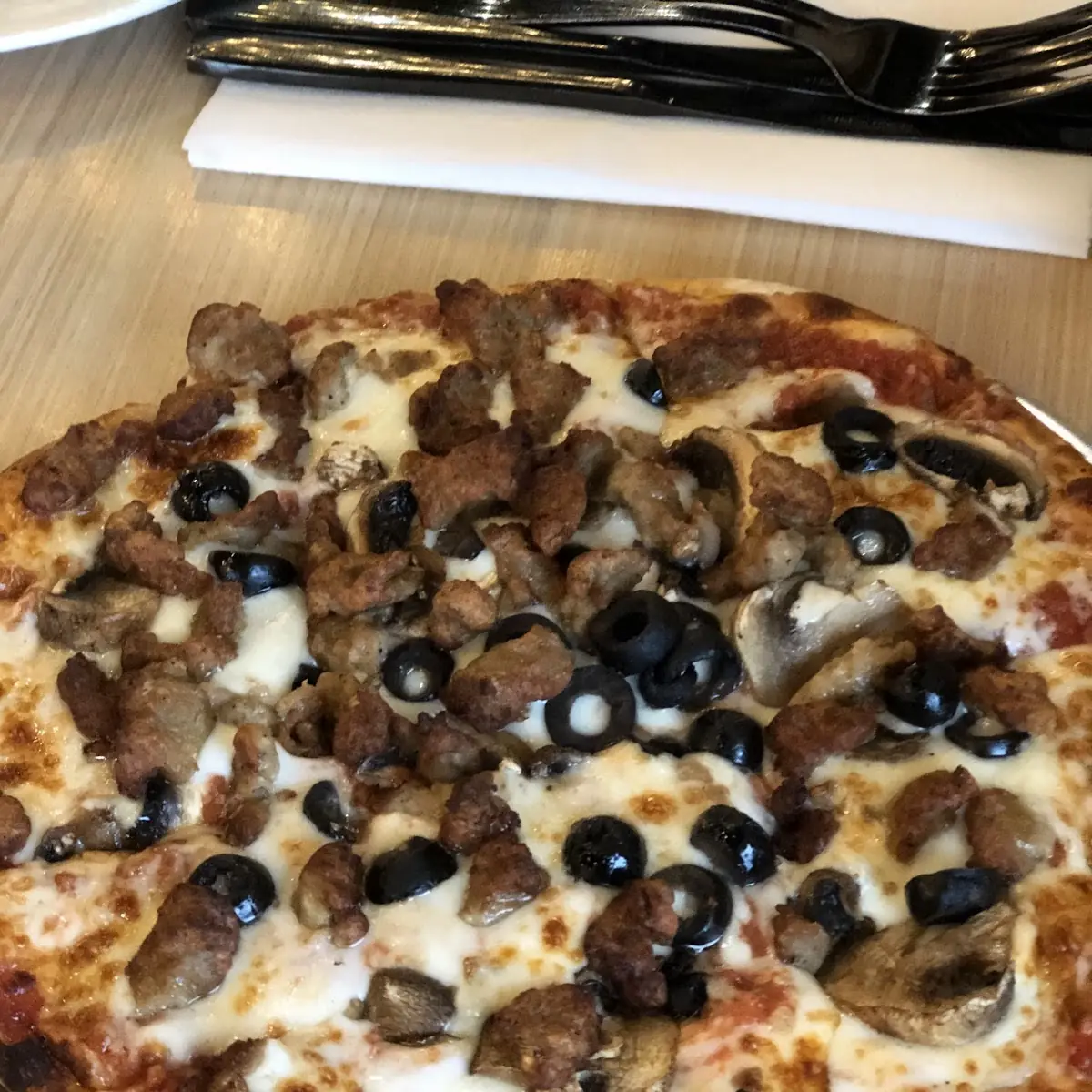 Sausage Black Olive Mushroom Pizza