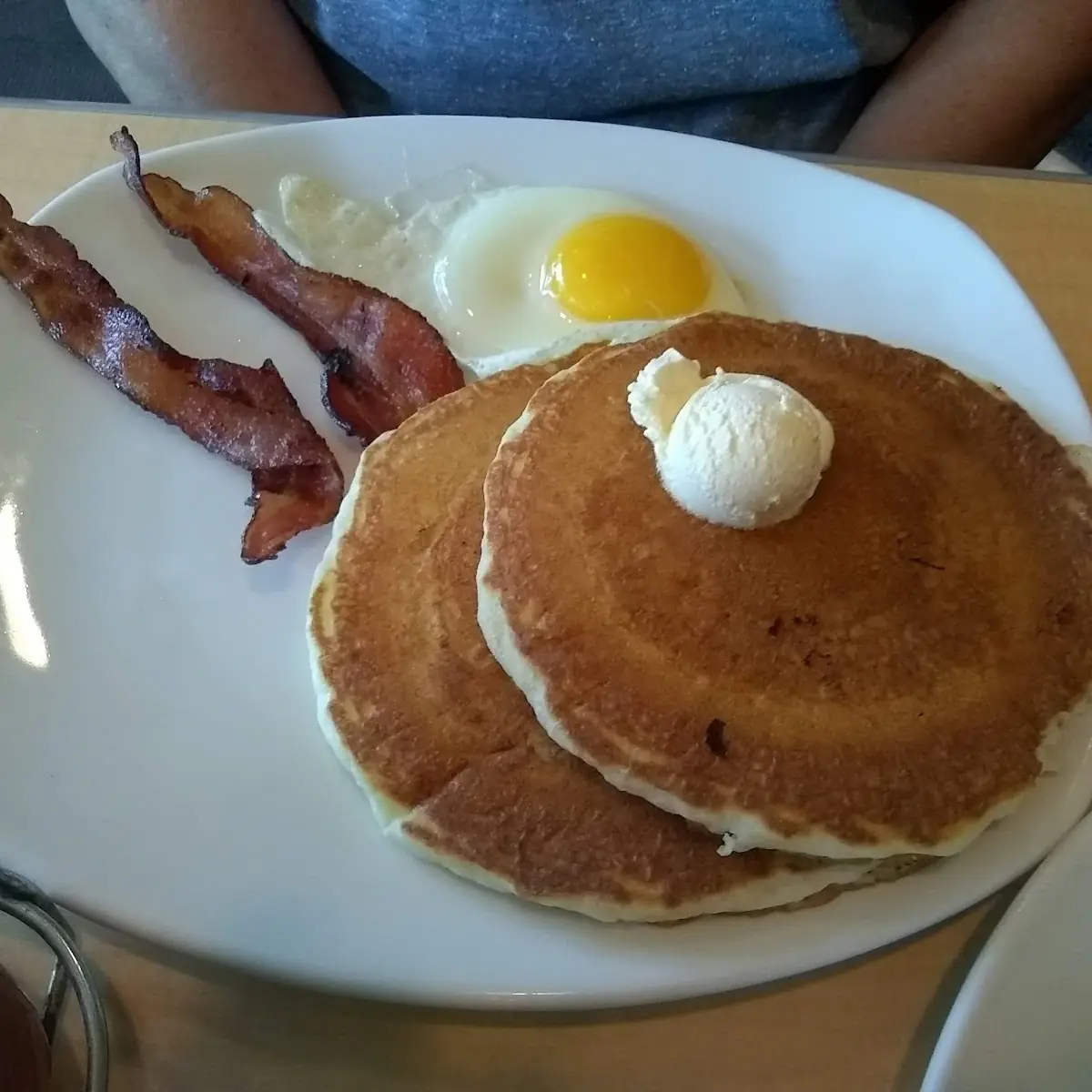 Pancakes Bacon and Two Eggs Sunny-Side Up