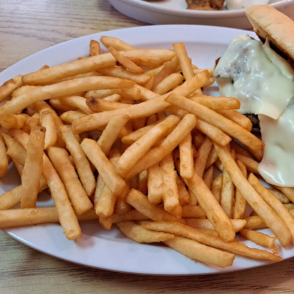 Philly Cheese Steak Sandwich and Fries