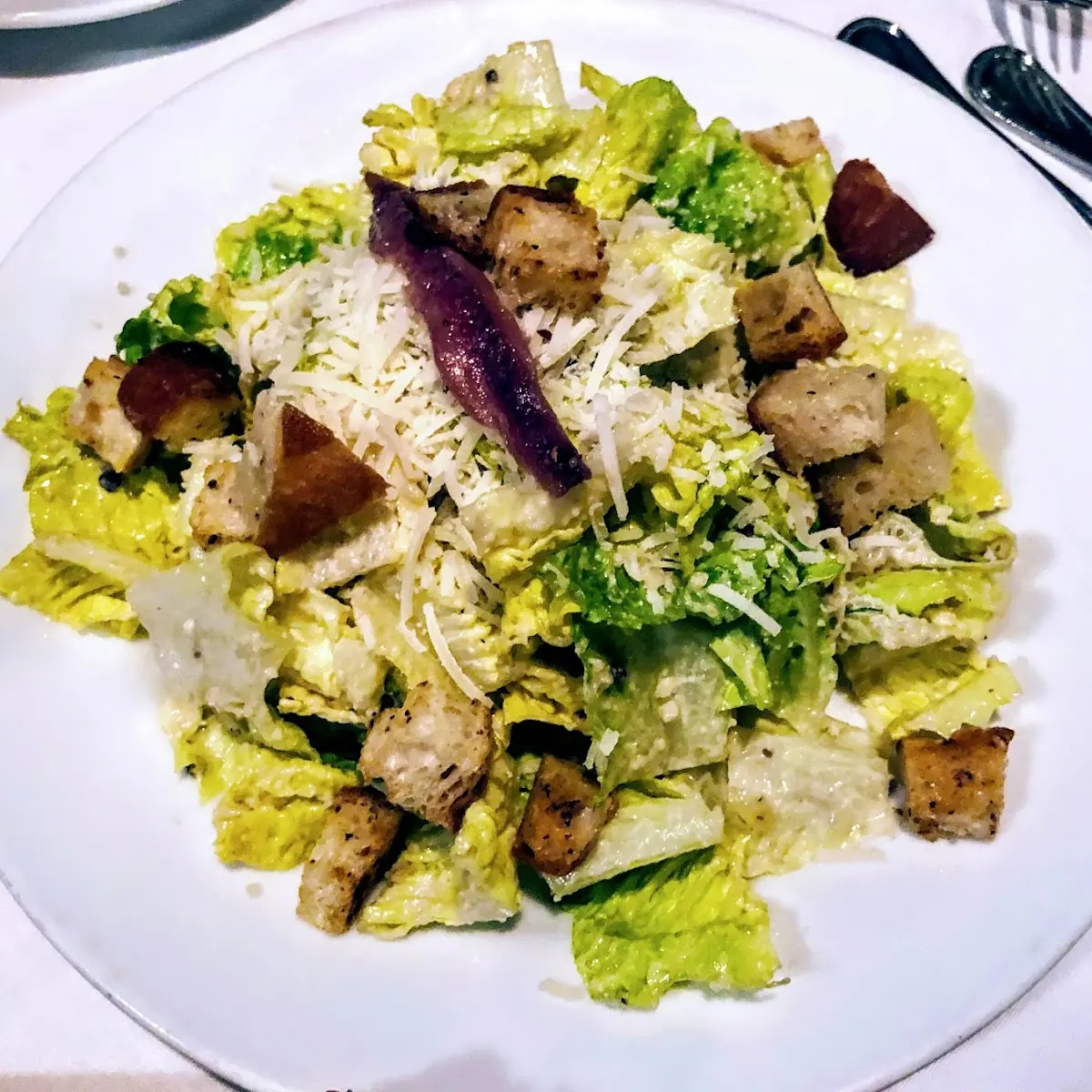 Harris' Caesar Salad with House Made Croutons Parmesan Cheese Anchovy