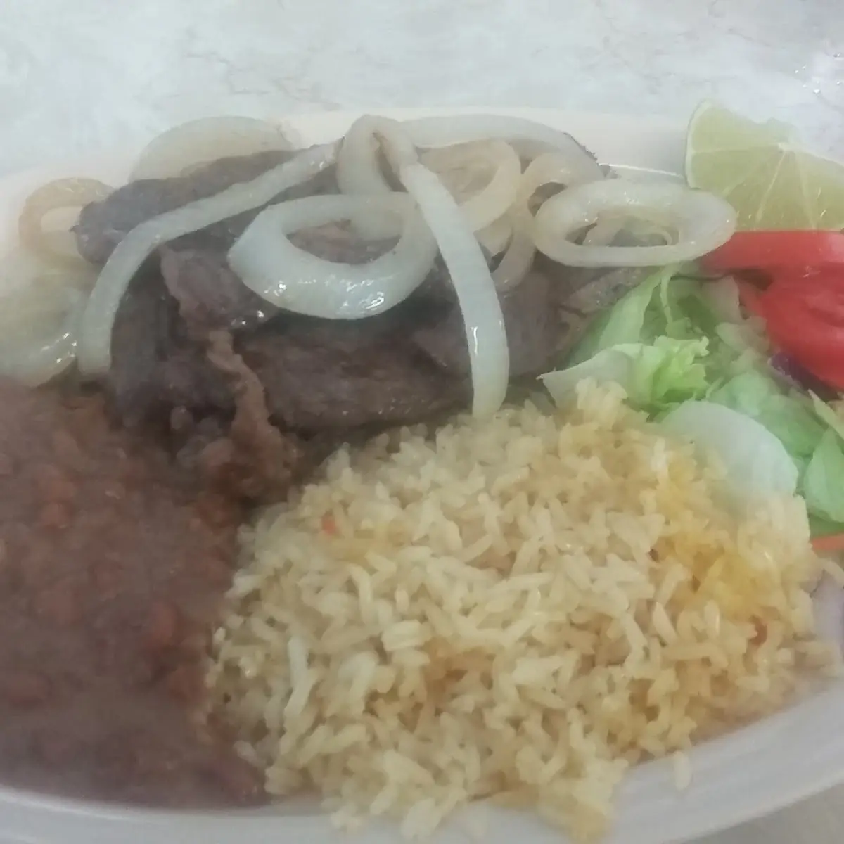 Bistec Encebollado
