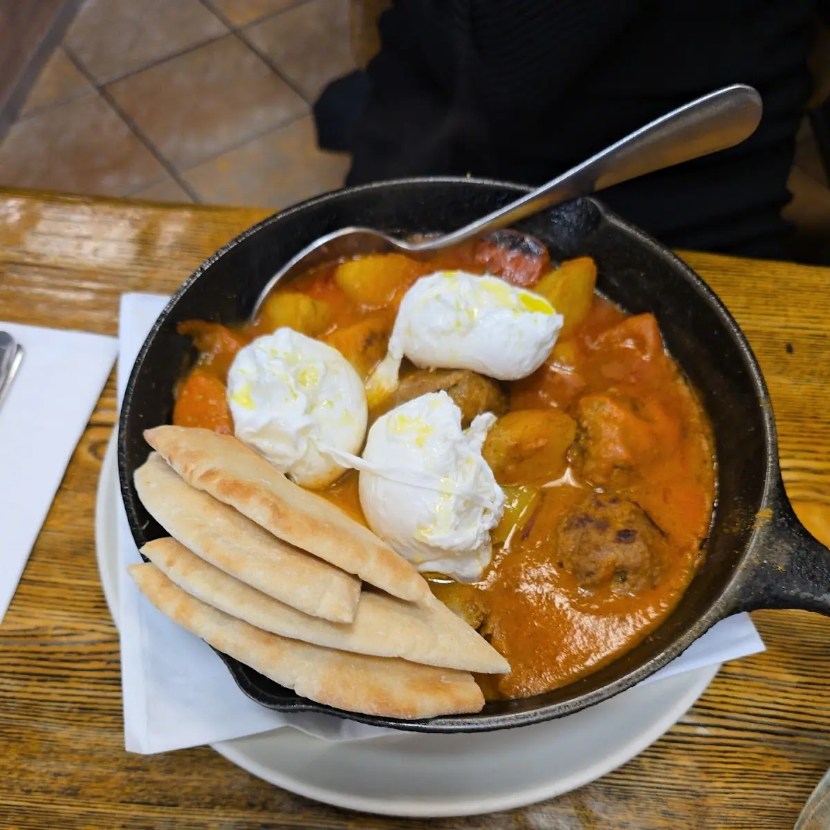 Three Poached Eggs with Meatball Stew