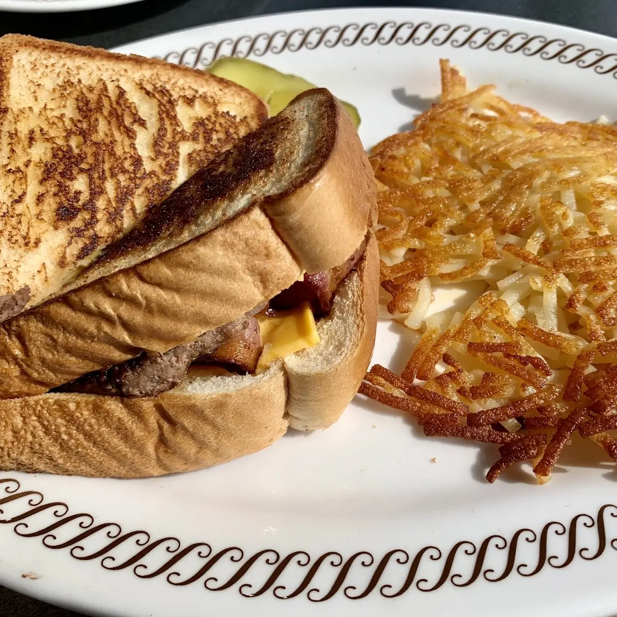 Two Egg Breakfast with Bacon Crispy Hash Browns