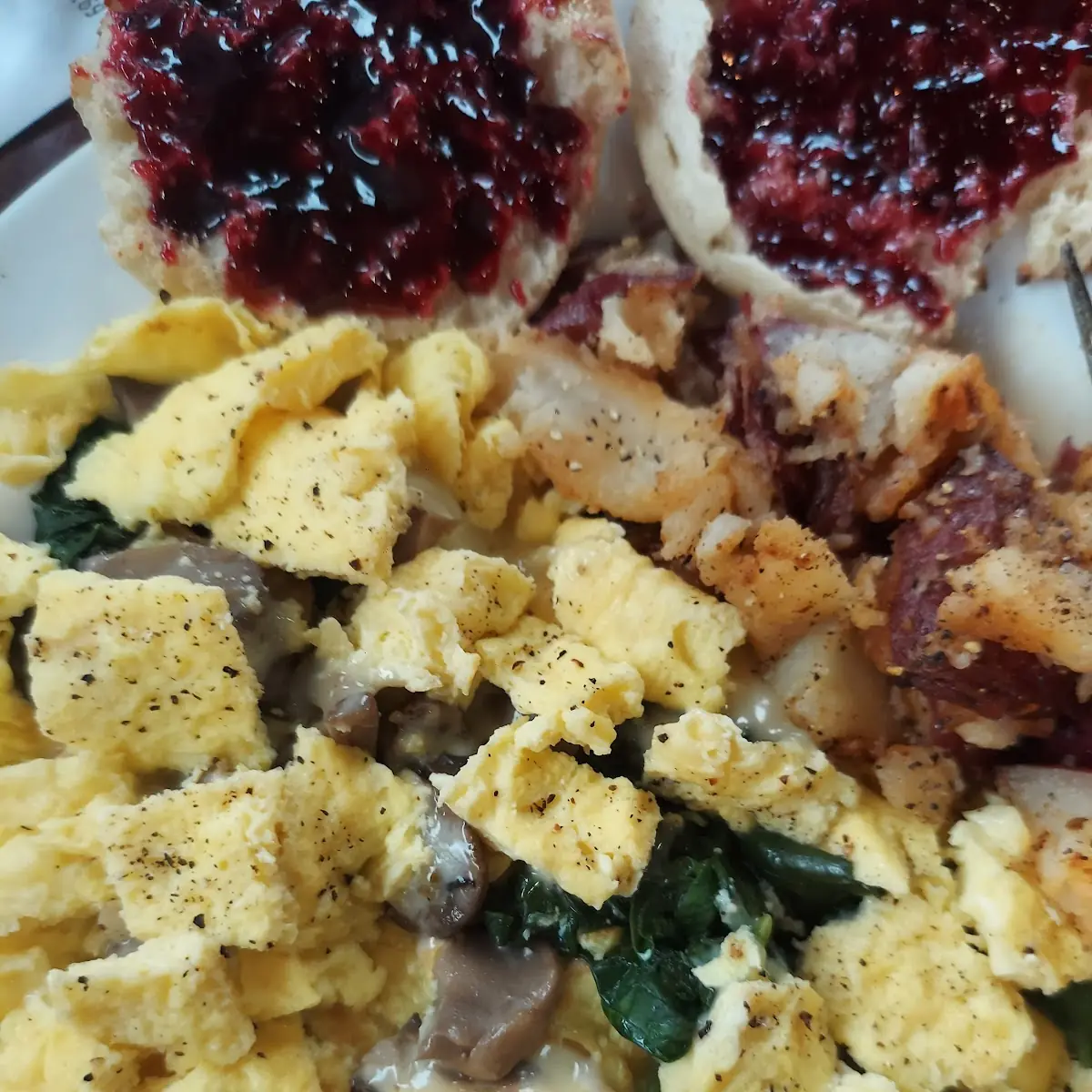 Spinach Xtra Mushroom Pepper Jack Cheese Omelette with Breakfast Potatoes and English Muffin