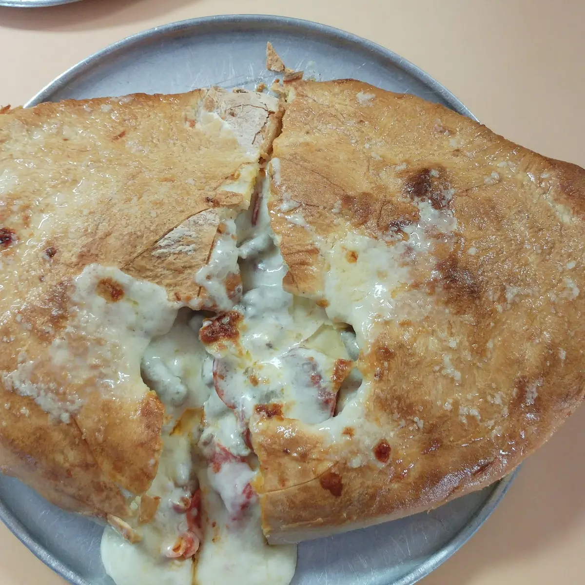 Meat Lover Calzone with White Sauce