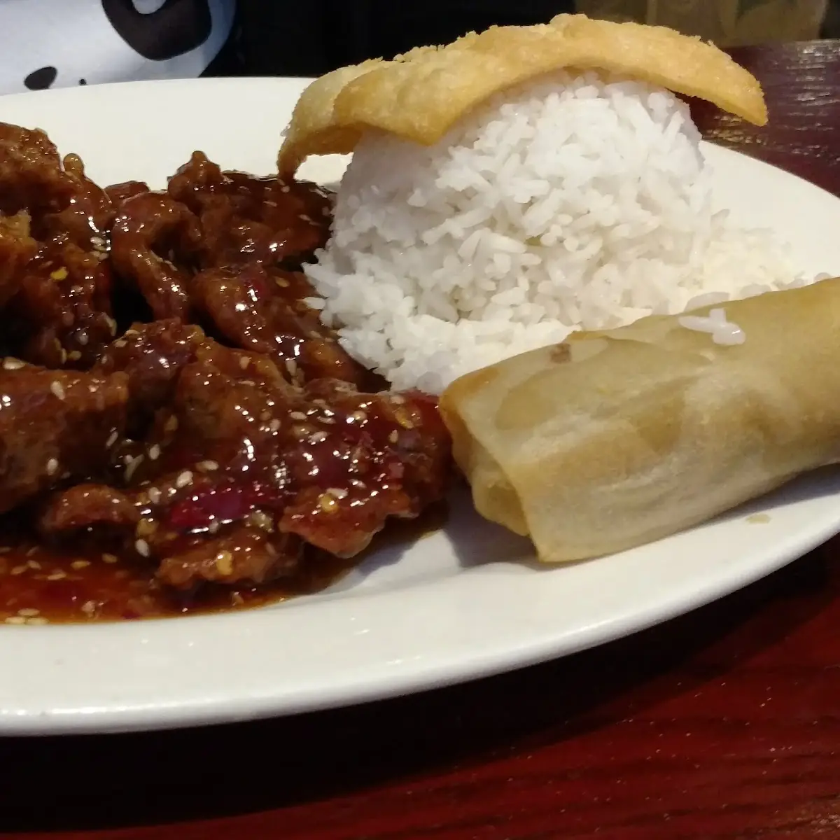 Sesame Beef and White Rice with an Egg Roll