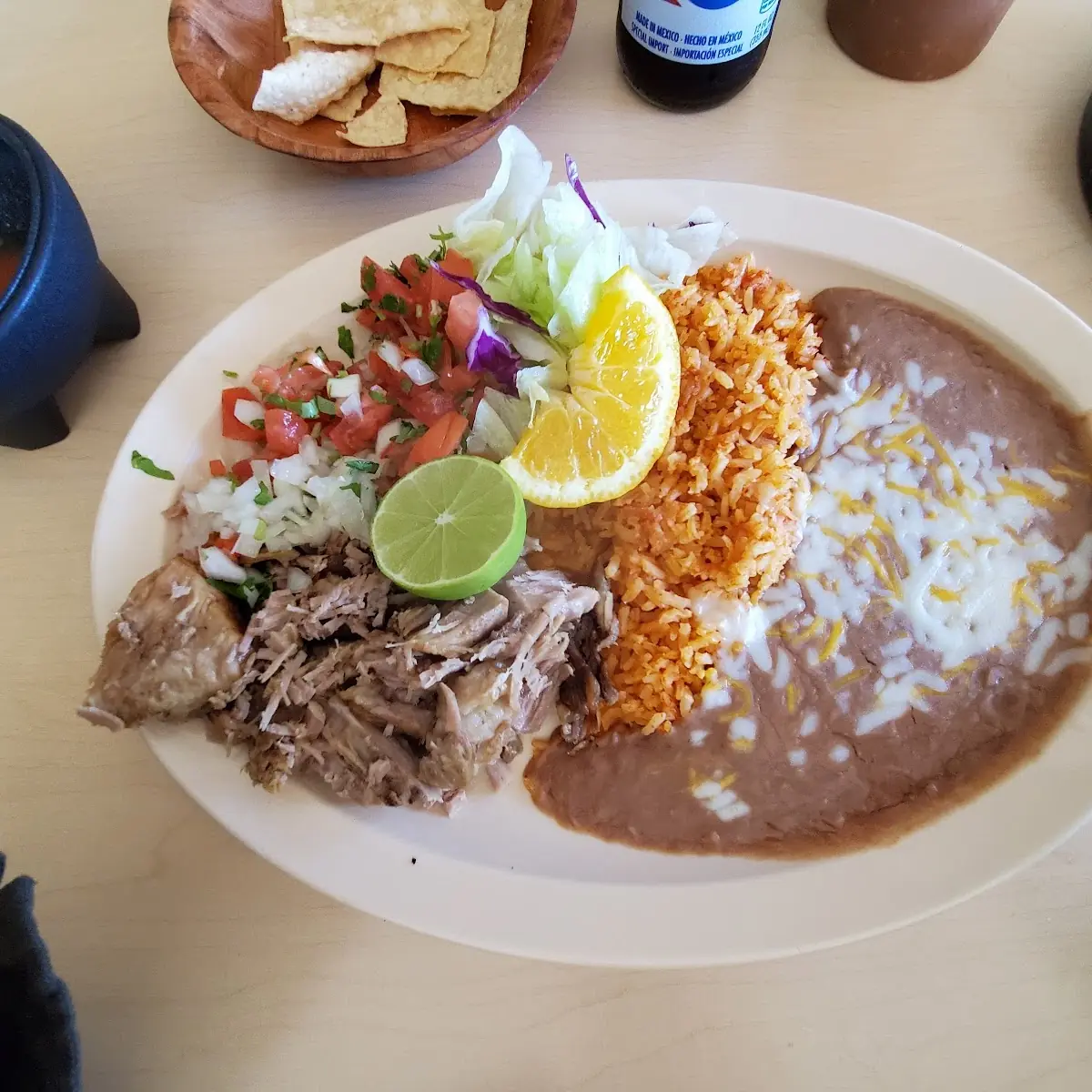 Carnitas with Mexican Rice and Refried Beans