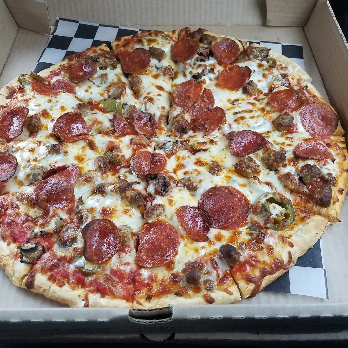 Mushroom Pepperoni and Sausage Pizza