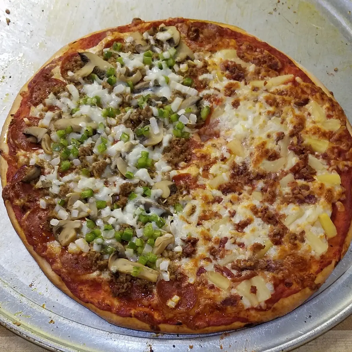 Half Deluxe Half Pepperoni Pineapple Bacon Pizza