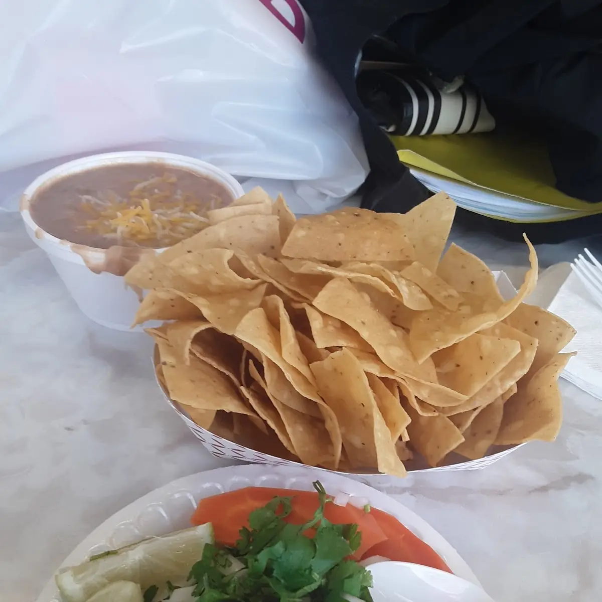 1 Taco Plus Chips Salsa Bar Beans